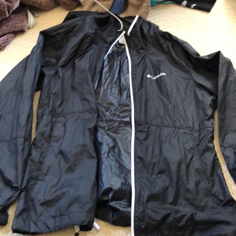 black windbreaker